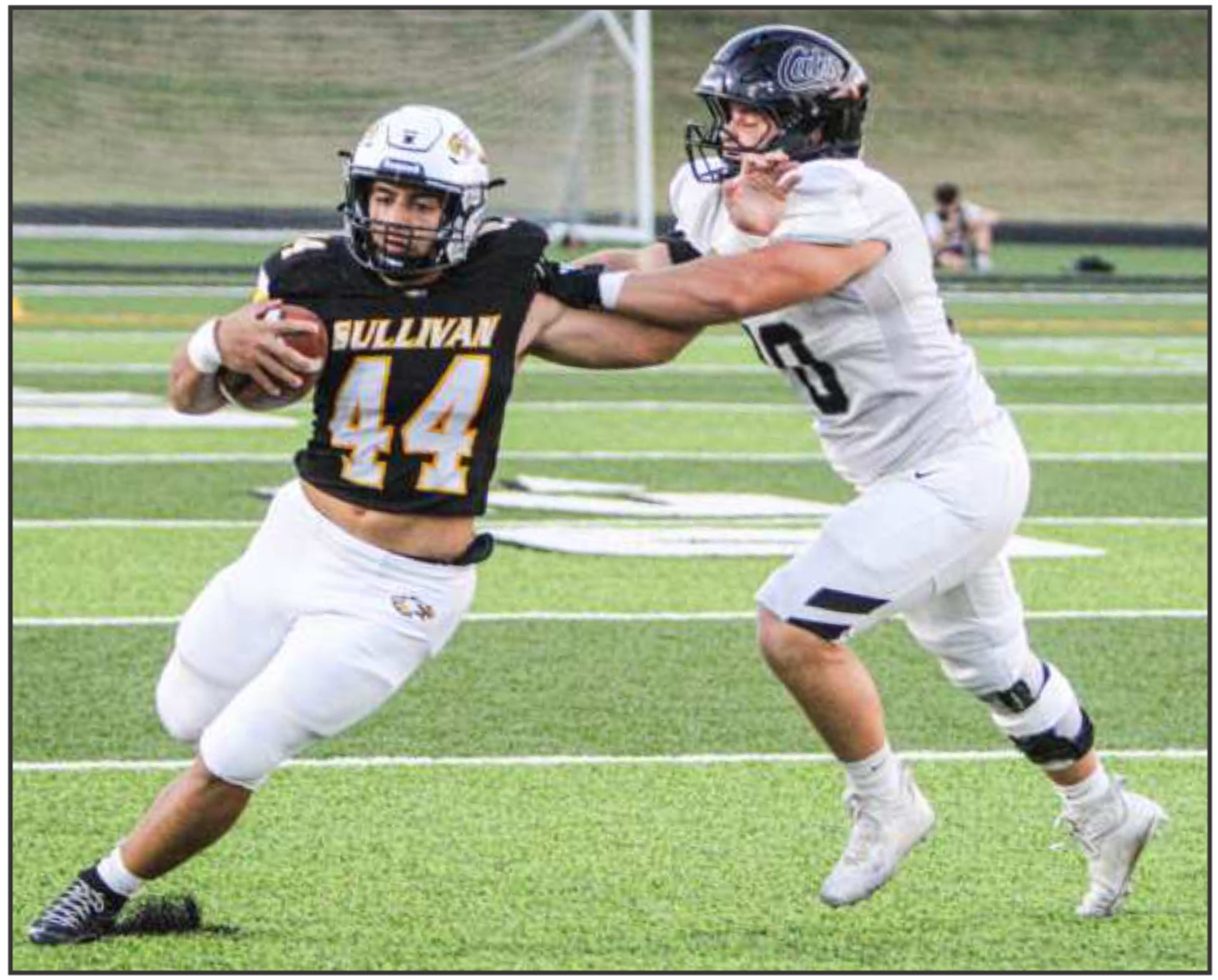Nathan Garcia #44 stiff arm run for Sullivan