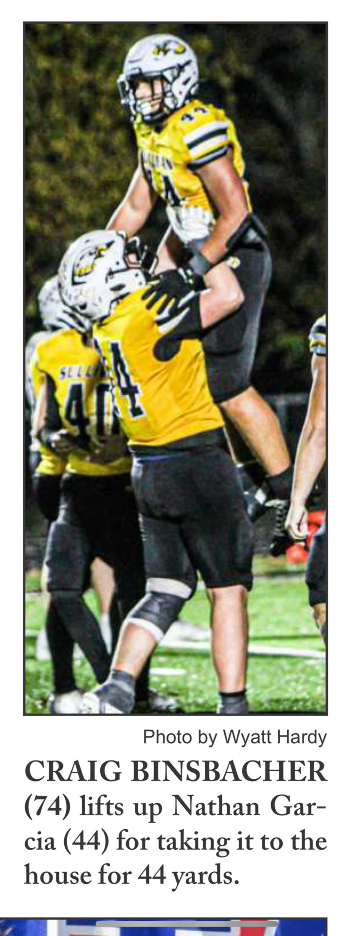 Nathan Garcia celebrated after 44-yard touchdown - newspaper clipping