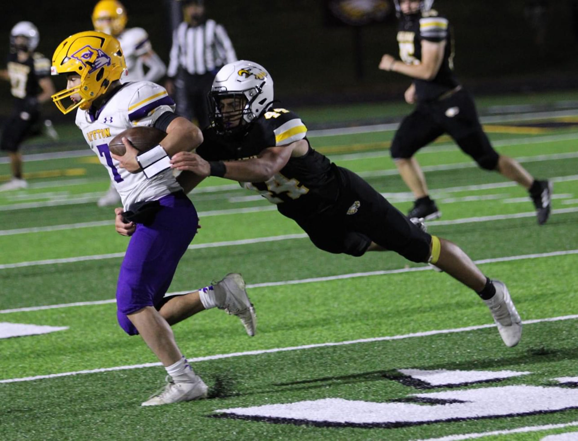 Nathan Garcia #44 diving tackle