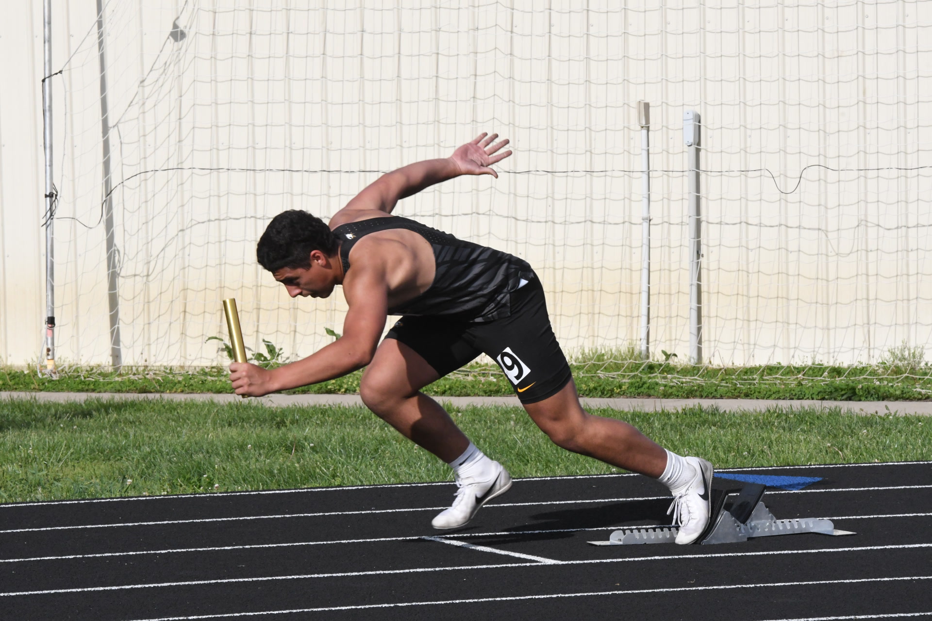 Nathan Garcia exploding off the blocks in 4x200 relay